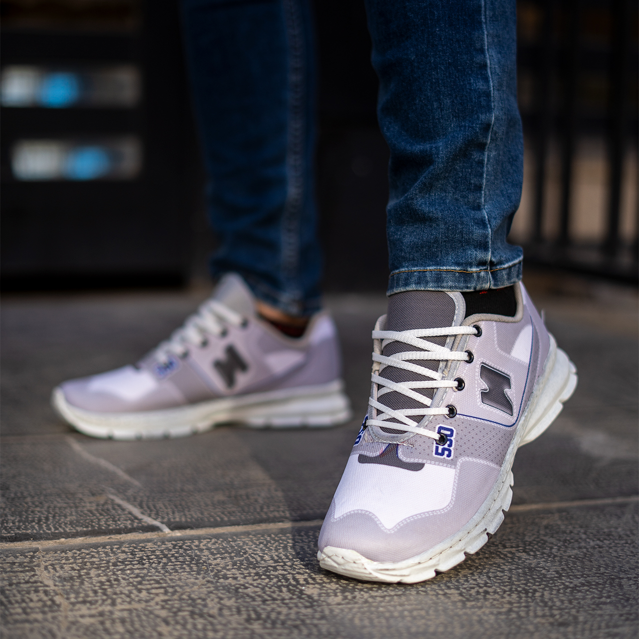 کفش ورزشی طوسی نیو بالانس مردانه مدل 550