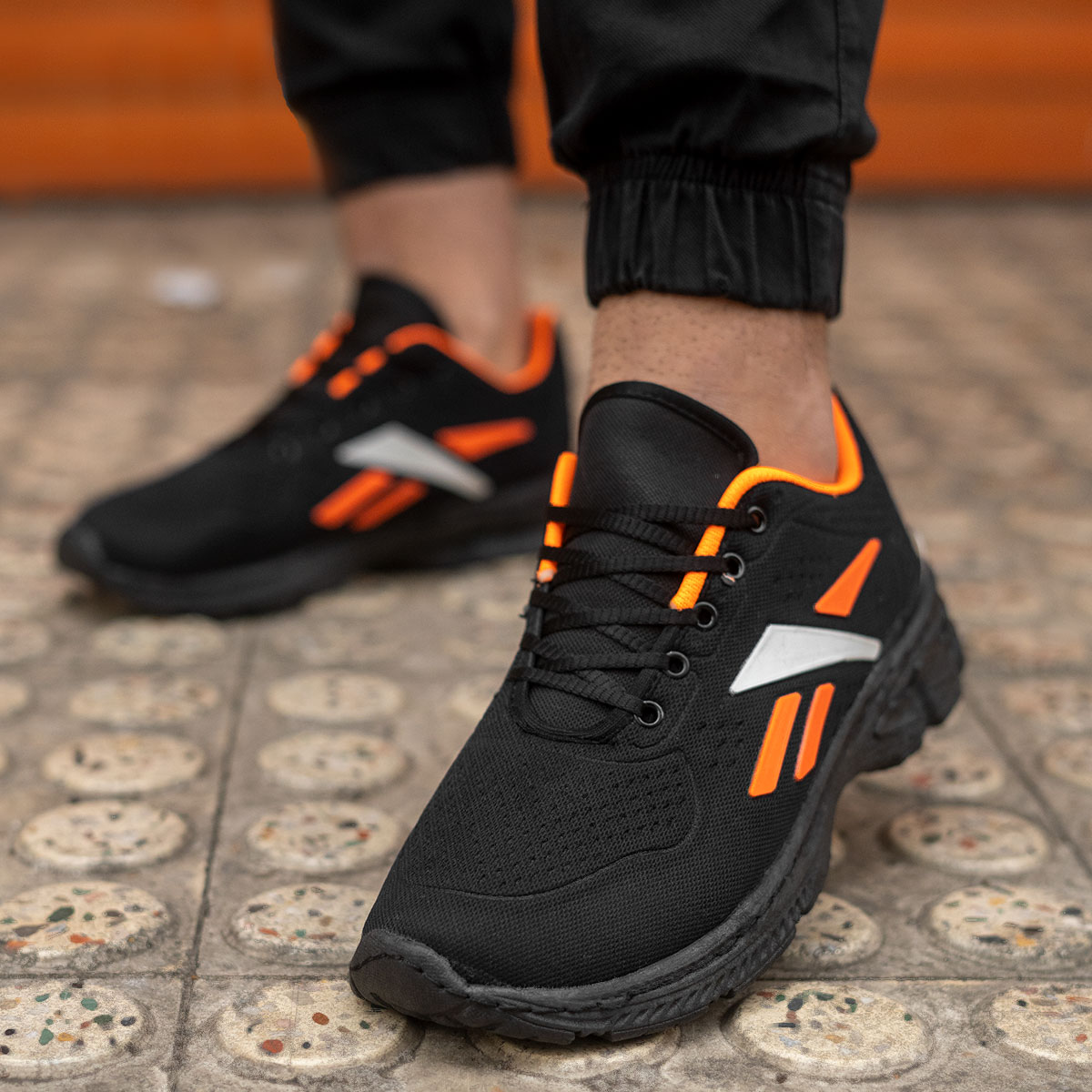 کفش ورزشی (T) ریبوک مشکی نارنجی مردانه مدل adena