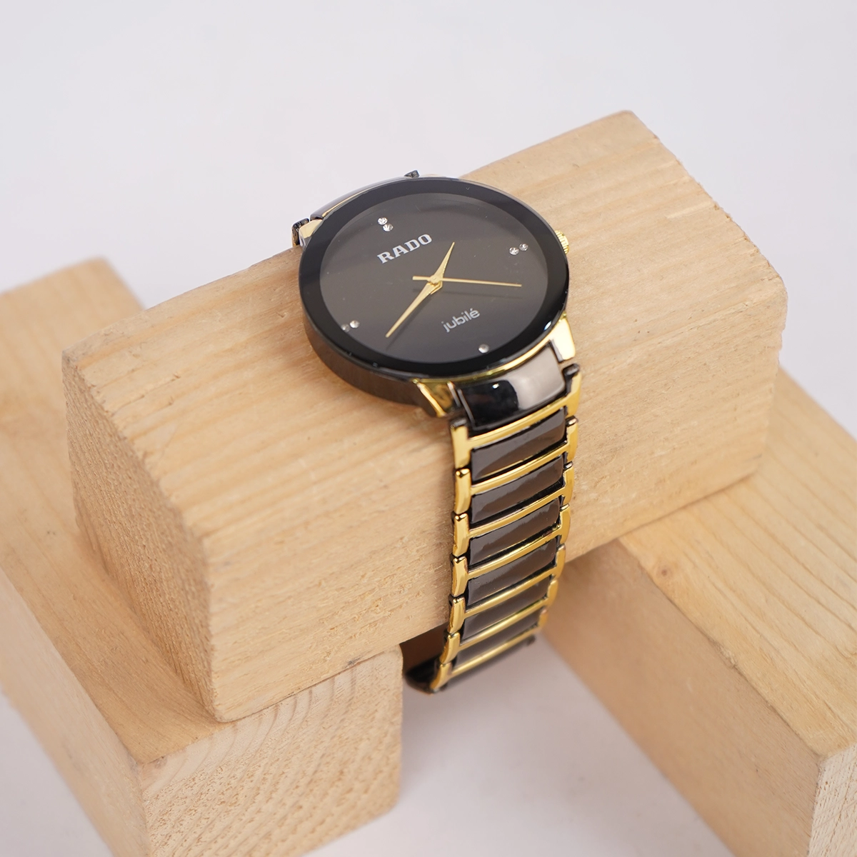 ساعت مشکی طلایی مردانه مدل Rado