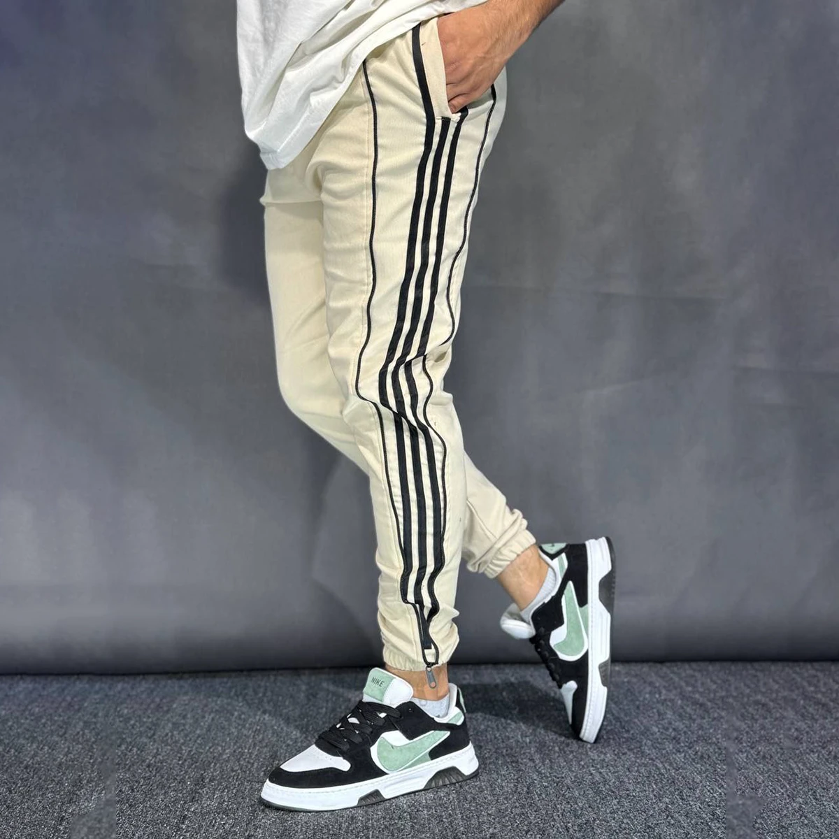 شلوار مردانه کرم بالنسیاگا ۳ نوار مدل تمام زیپ