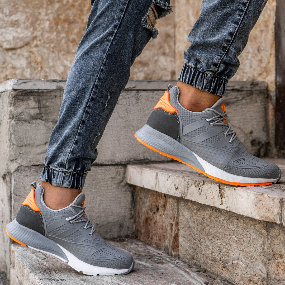 کفش ورزشی Adidas نارنجی طوسی مردانه مدل Ipala